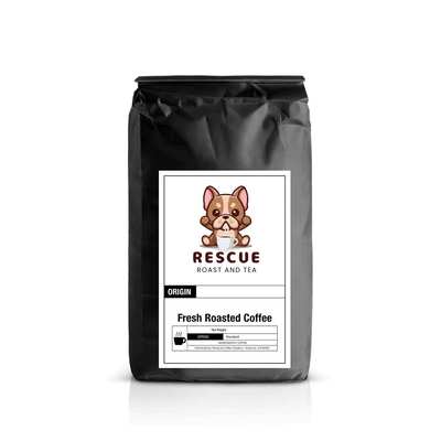 Black bag with a label featuring a dog holding a coffee cup and text 'Rescue Roast and Tea'.