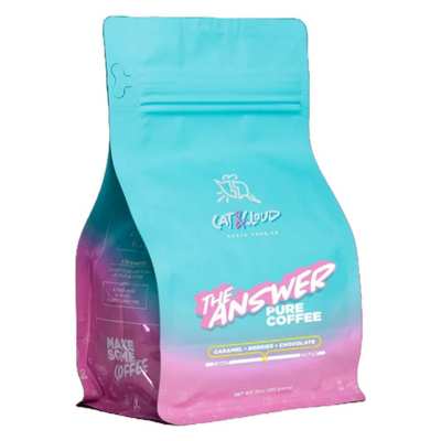 The image shows a colorful bag of Cat & Cloud coffee with a gradient blue to pink design and the text 'The Answer Pure Coffee'.