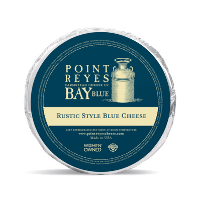 The image shows a blue and white cheese wheel labeled 'Point Reyes Farmstead Cheese Company Bay Blue Rustic Style Blue Cheese'.
