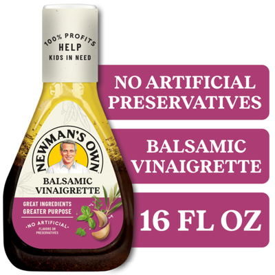 A bottle of Newman's Own Balsamic Vinaigrette with a purple label and yellow cap.