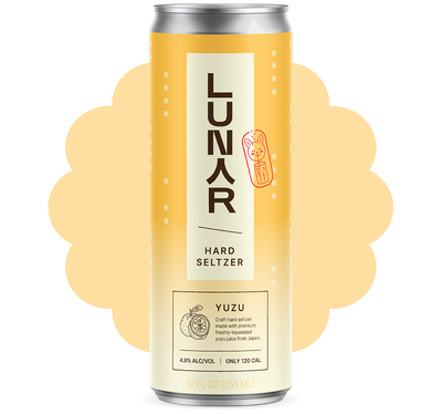 A 12 fl oz can of Lunar Yuzu Hard Seltzer with a yellow design and visible label text.