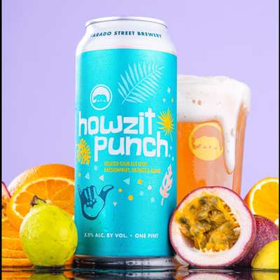 A 16 fl oz can of Alvarado Street Brewery Howzit Punch Sour Ale with a colorful design featuring tropical fruit illustrations.