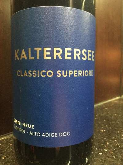 A blue wine bottle label with 'Kalterersee Classico Superiore' in gold text.